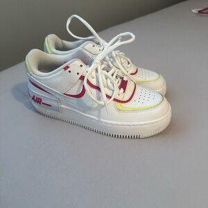 Nike White Sneakers with Pink and Yellow Highlights